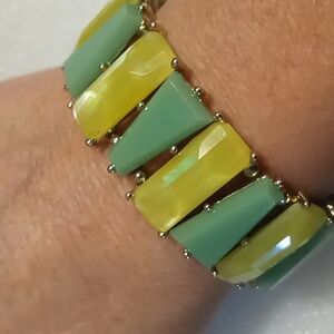 Glitter green and opalescent yellow expandable bracelet. Like new